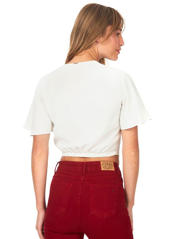 blusa cropped polo